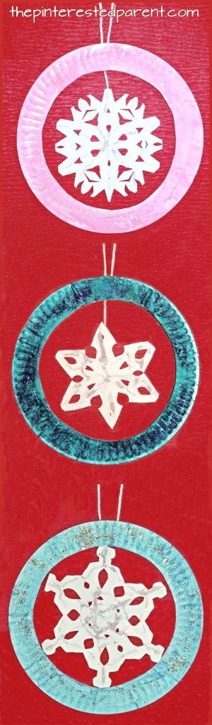 giant paper plate snowflake ornaments for the winter. Christmas crafts for kids and preschoolers.
