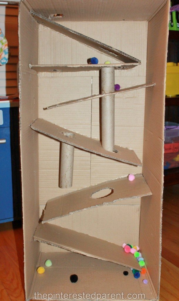 Cardboard box marble & pom pom ramp. This was so much fun & a great activity for kids - arts & crafts from recyclables