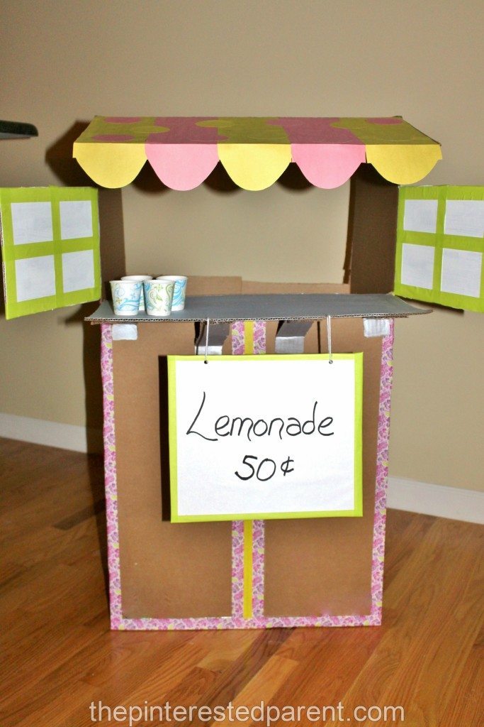 Don't toss your old cardboard boxes. Upcycle them into fun.Cardboard box lemonade stand for the kids
