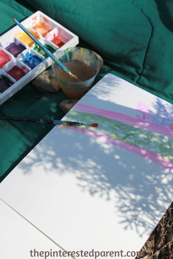 Painting shadows with watercolors - this is a wonderful spring or summer art project that you can do with your kids while exploring shadow & light and nature