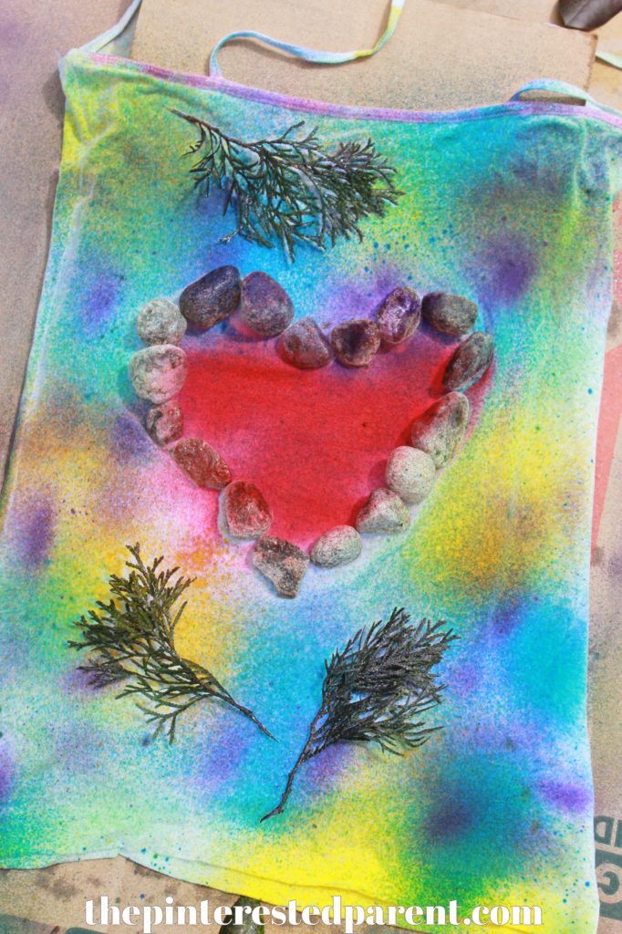 Nature Tie Dye Shirts - These t-shirt designs were made from rocks, leaves, twigs & other things found in nature.. This is a fun spring or summer art activity & craft for kids or adults