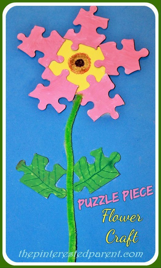 Don't toss your old puzzle pieces, Recycle them into a lovely kids craft for spring. Puzzle piece flower