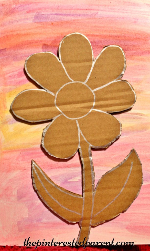 Glittery cardboard flower on watercolor paints - a pretty spring or summer arts & crafts project for kids