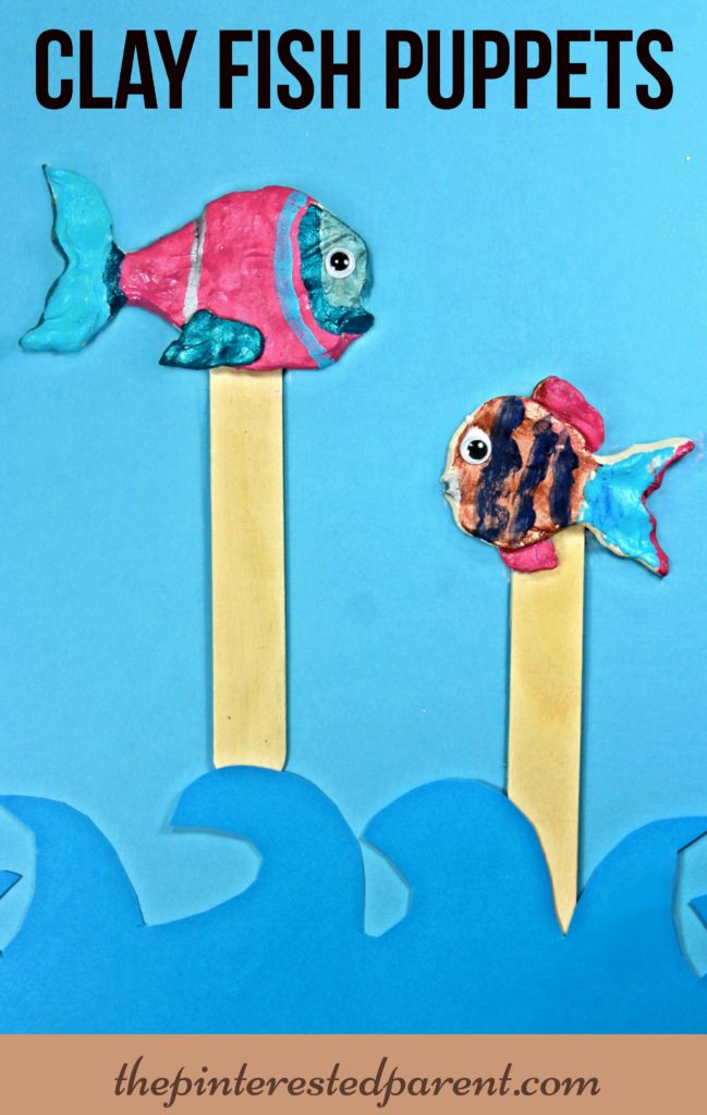Painted air dry clay fish puppets - summer arts & crafts for kids