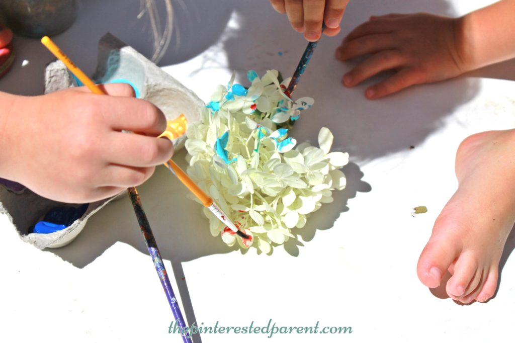 Painting flower petal - nature arts & crafts activities for kids. This is a wonderful spring & summer art project that you can do outdoors..