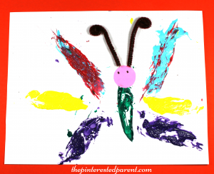 feather stamped painted butterfly process arts & craft for the kids with a feather