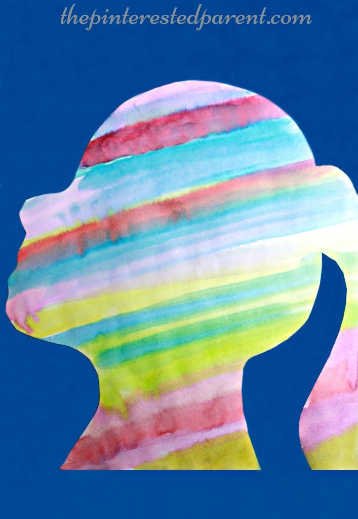 Cut your child's silhouette and paint it in watercolors. kid's arts and crafts - process art, preschoolers