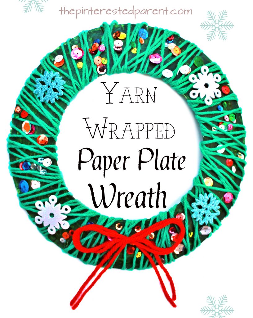 Yarn wrapped paper plate Christmas wreath - winter kid's arts and crafts an fine motor skill activity