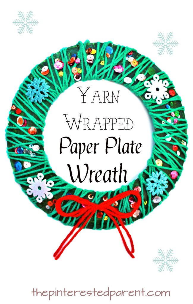 Yarn wrapped paper plate Christmas wreath - winter kid's arts and crafts an fine motor skill activity