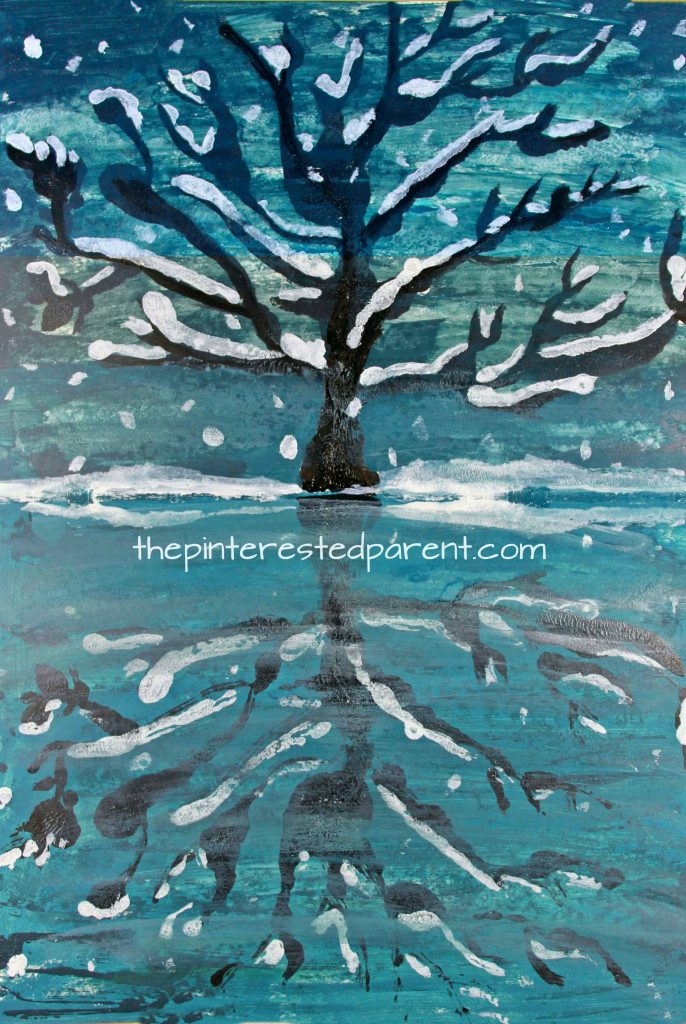 Try this step by step paint and fold paint and print reflection landscape. Winter snowy tree and lake painting. A great art project for kids or adults. Arts and crafts.