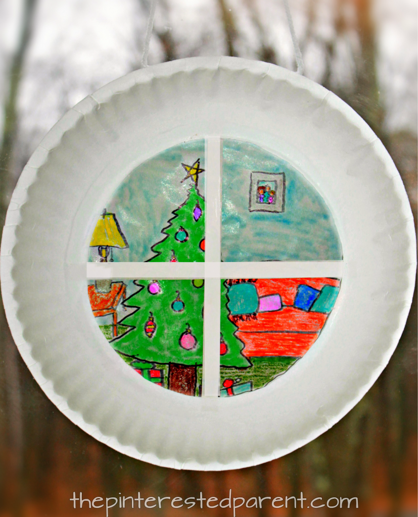Paper plate sun catcher or luminary Christmas window scene. holiday and winter arts and crafts for the kids. Wax paper and SHarpies