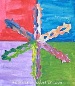 Snowflake pop art watercolor painting for kids. Kids holiday and winter arts and craft. I love the abstract look to this.