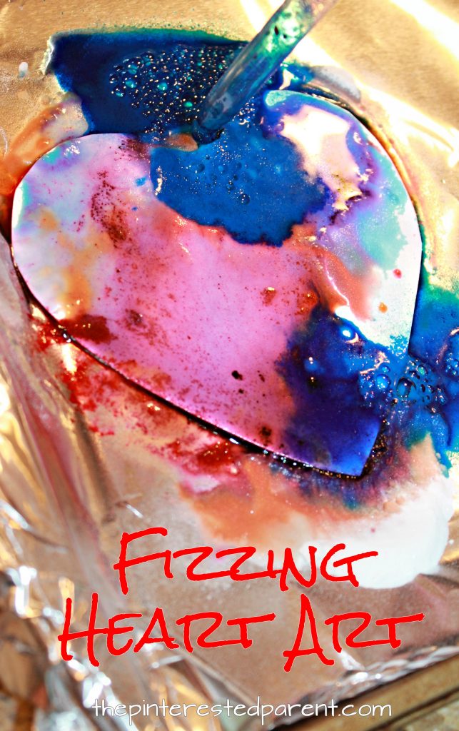 Fizzing baking soda and vinegar heart paint eruptions. Science and art fun for kids perfect for Valentines Day or any time. Also great for fine motor skills. Arts and crafts activities for kids & toddlers.
