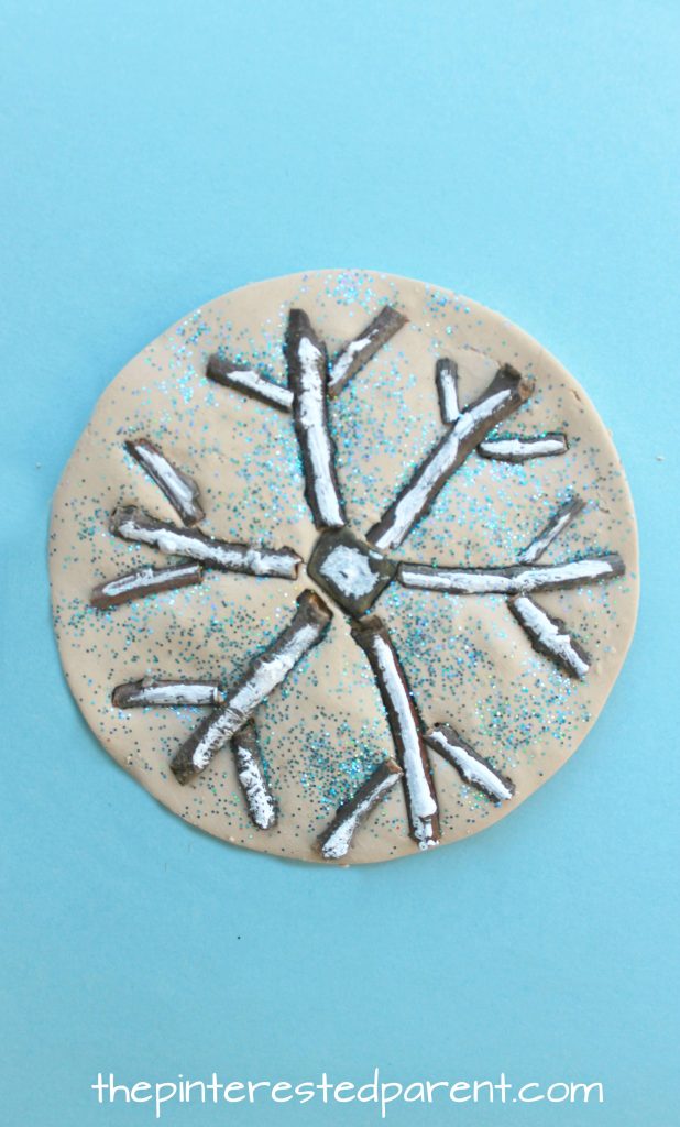 Sticks and stones snowflake winter nature crafts - use clay, salt dough or play dough to set these pretty seasonal arts and crafts projects for kids, rock snowman, twig snowflake & Christmas tree