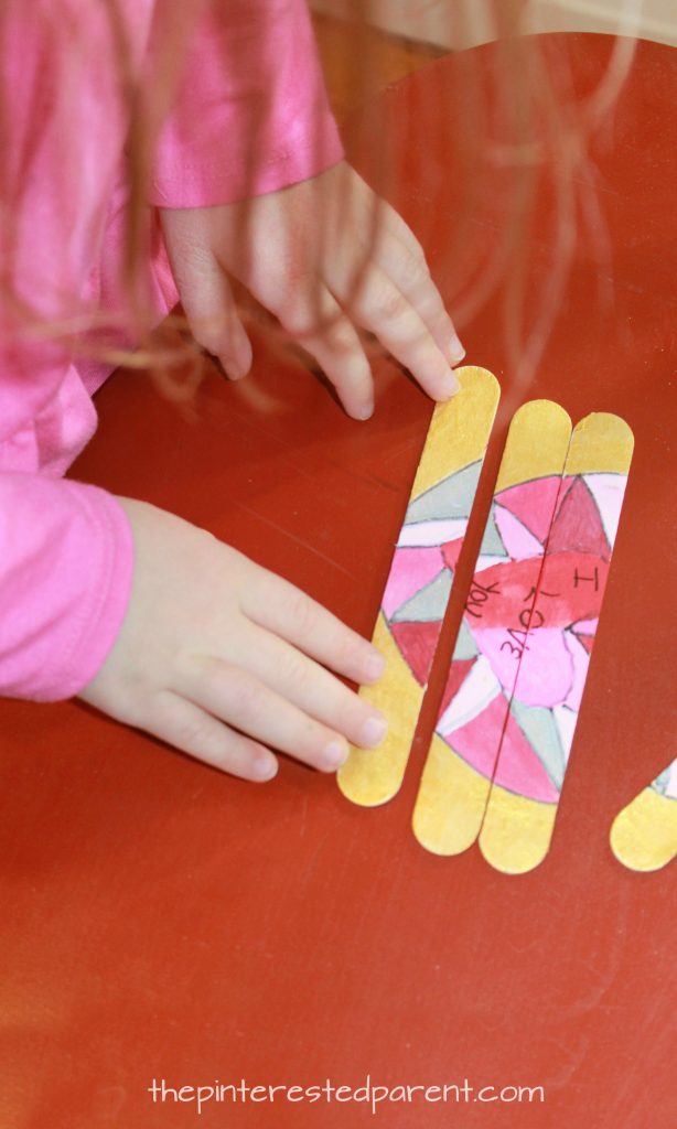 Popsicle stick Valentine's heart puzzle. Make a sweet message for mom, dad or grandma and grandpa. Arts & crafts for kids and preschoolers. Cute gift idea.