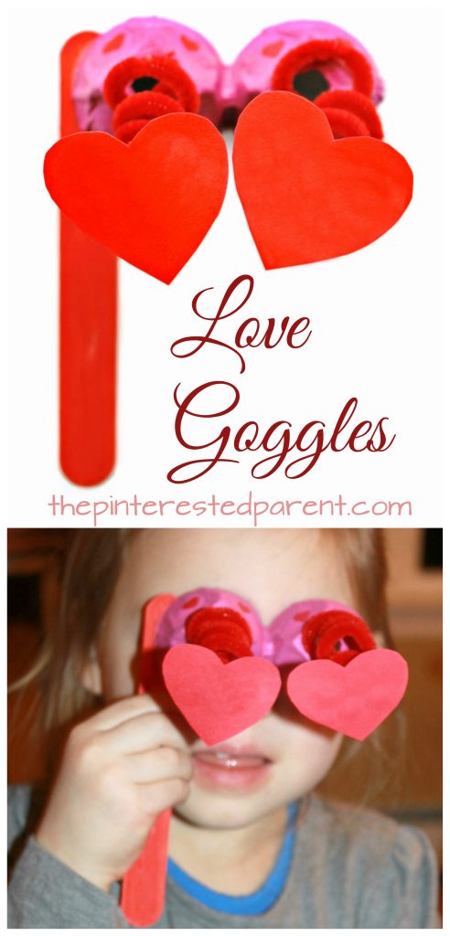 Springy love goggles made out of egg carton & pipe cleaner - Valentine's Day arts & crafts for kids. Recyclable dangling heart glasses