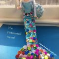 Use an old tube sock and some sequins to make this no sew mermaid tail for your Barbie. Arts and crafts for your kids
