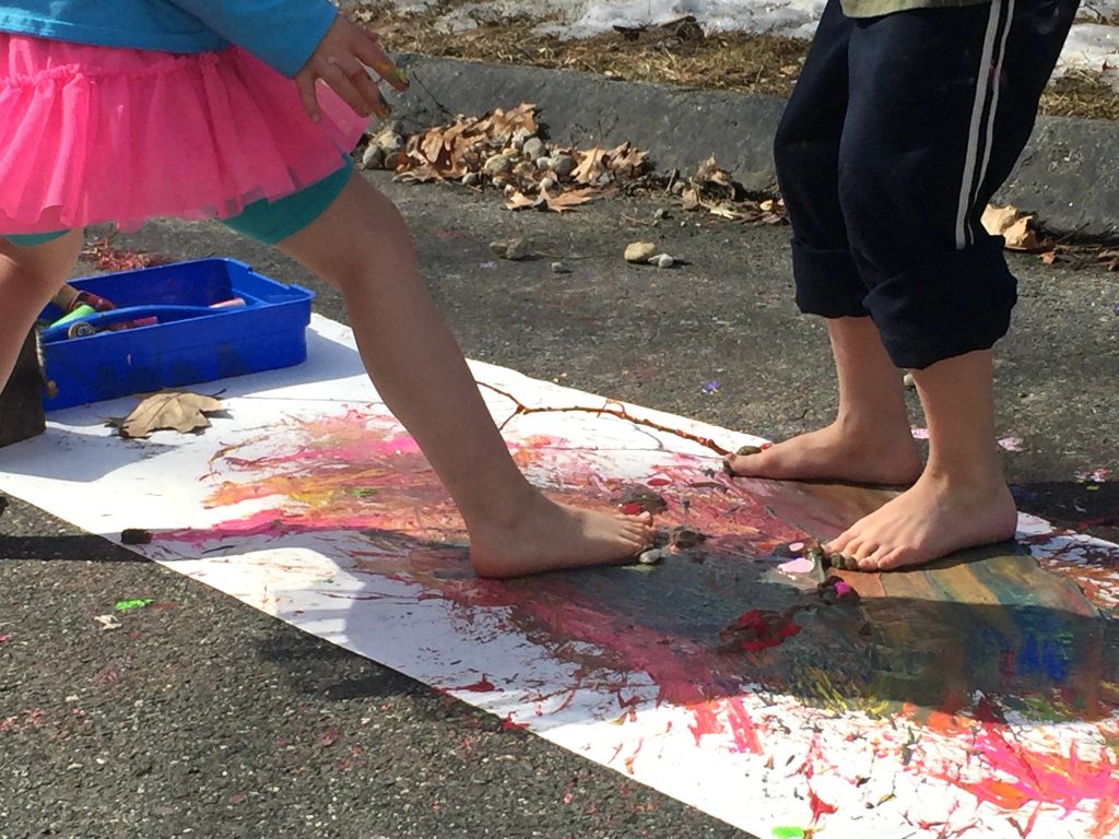 Messy paint play for the kids. Paint with hands and feet. Messy process art & play