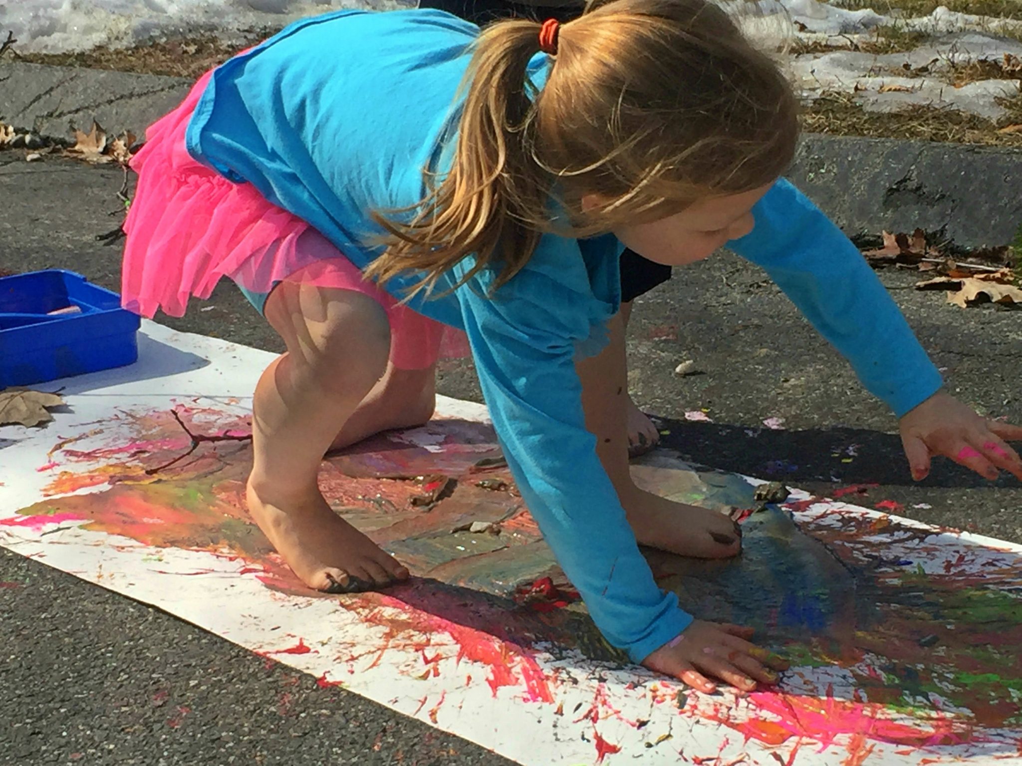 Messy paint play for the kids. Paint with hands and feet. Messy process art & play