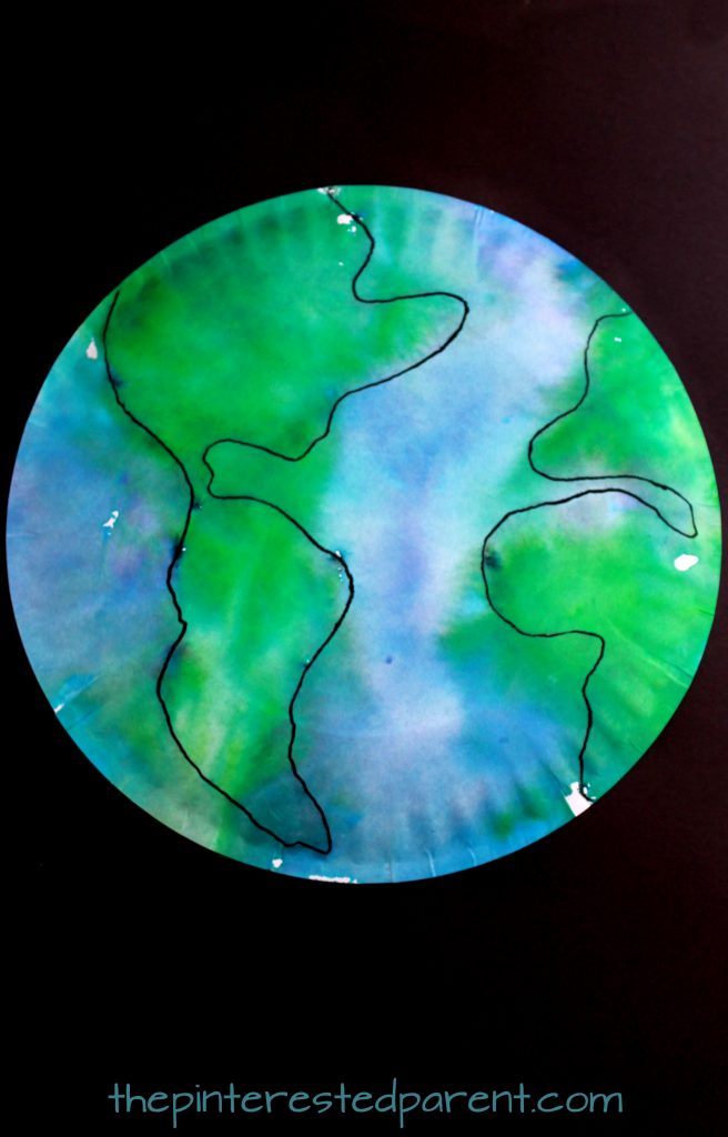 Painting with bleeding tissue paper. Paper plate Earth Day arts and craft for kids.
