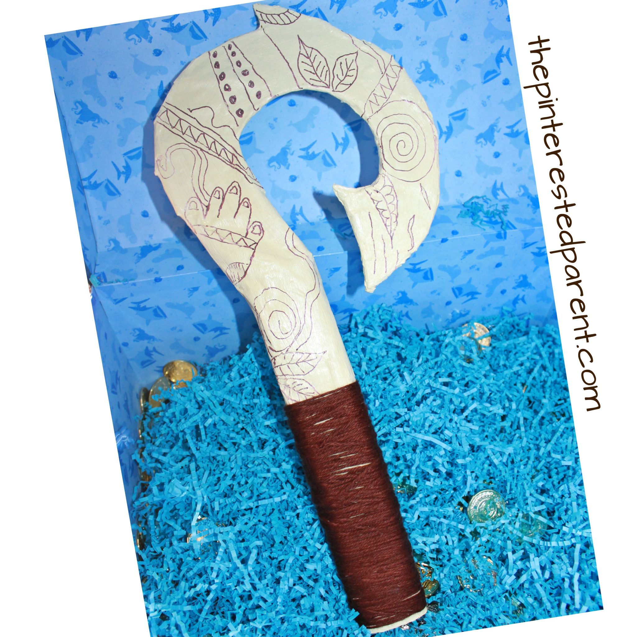 Moana inspired paper mache Maui fish hook. Use recyclables for a fun Disney inspired prop for pretend play. Kid's arts and crafts