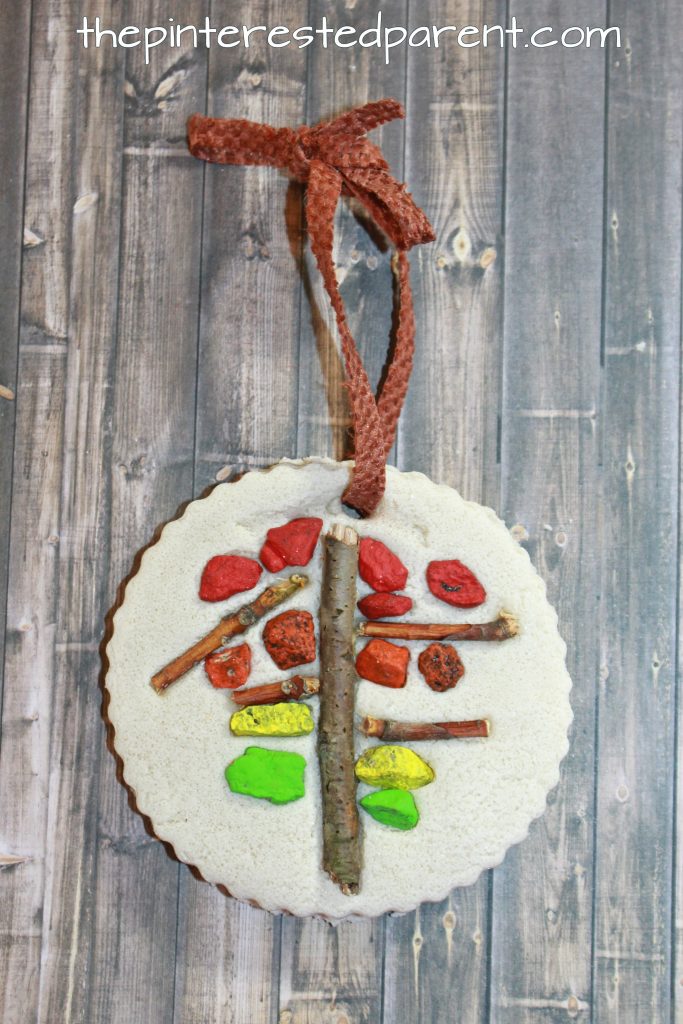Salt dough and nature fall tree mosaics - autumn arts and crafts for kids. Use pebbles, small rocks and sticks to make these pretty ornaments