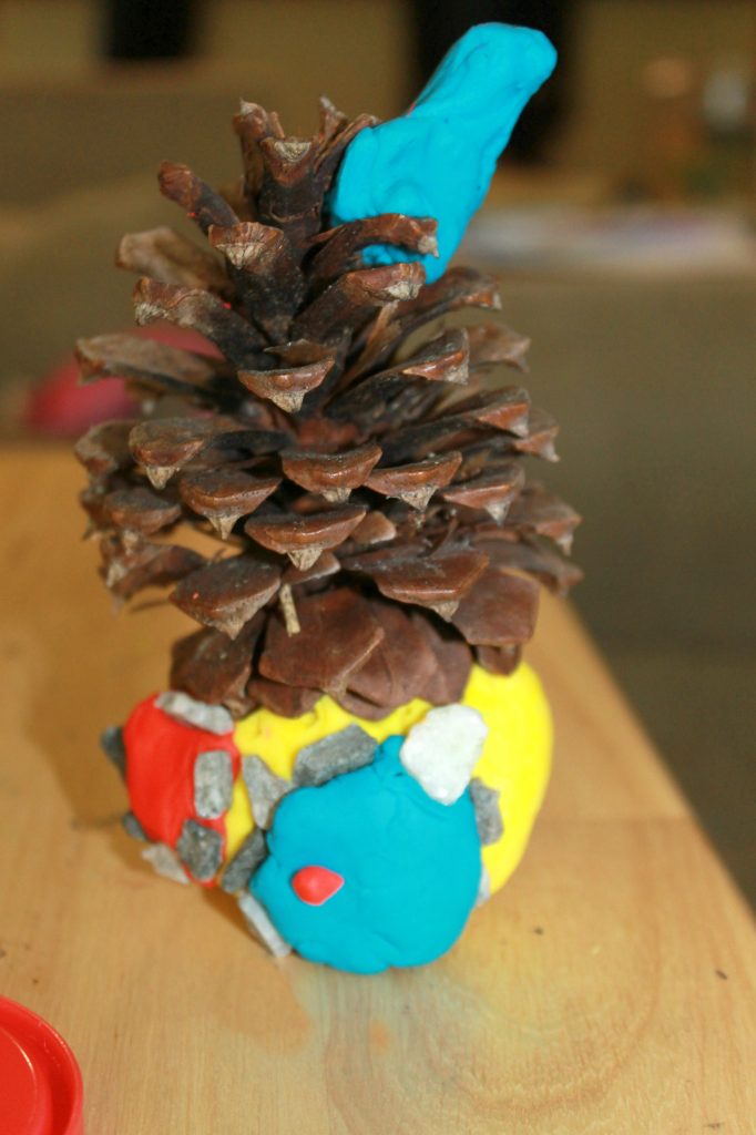 Pine cone and salt dough fairy houses. Magical nature arts and crafts for kids