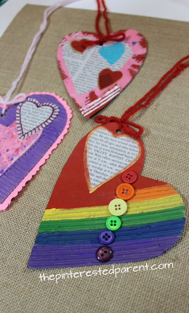 Mixed media corrugated cardboard hearts. Valentine's arts and crafts for kids.